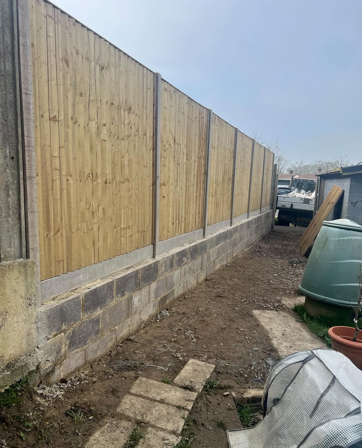 Fence panels with concrete block base
