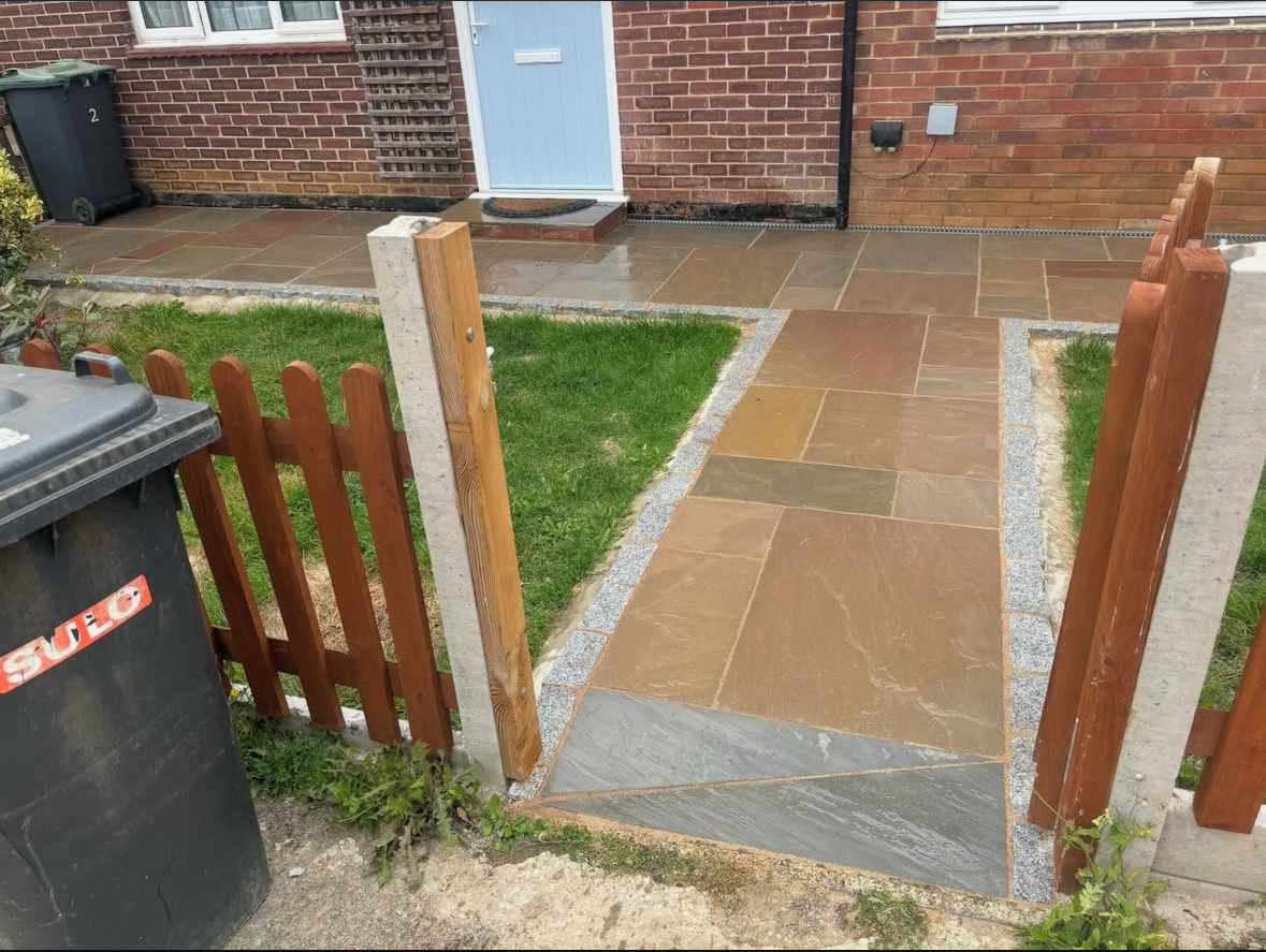 Sandstone paving with timber fencing